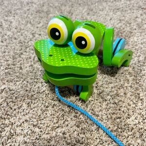 Melissa & Doug First Play Frolicking Frog Wooden Pull Toy